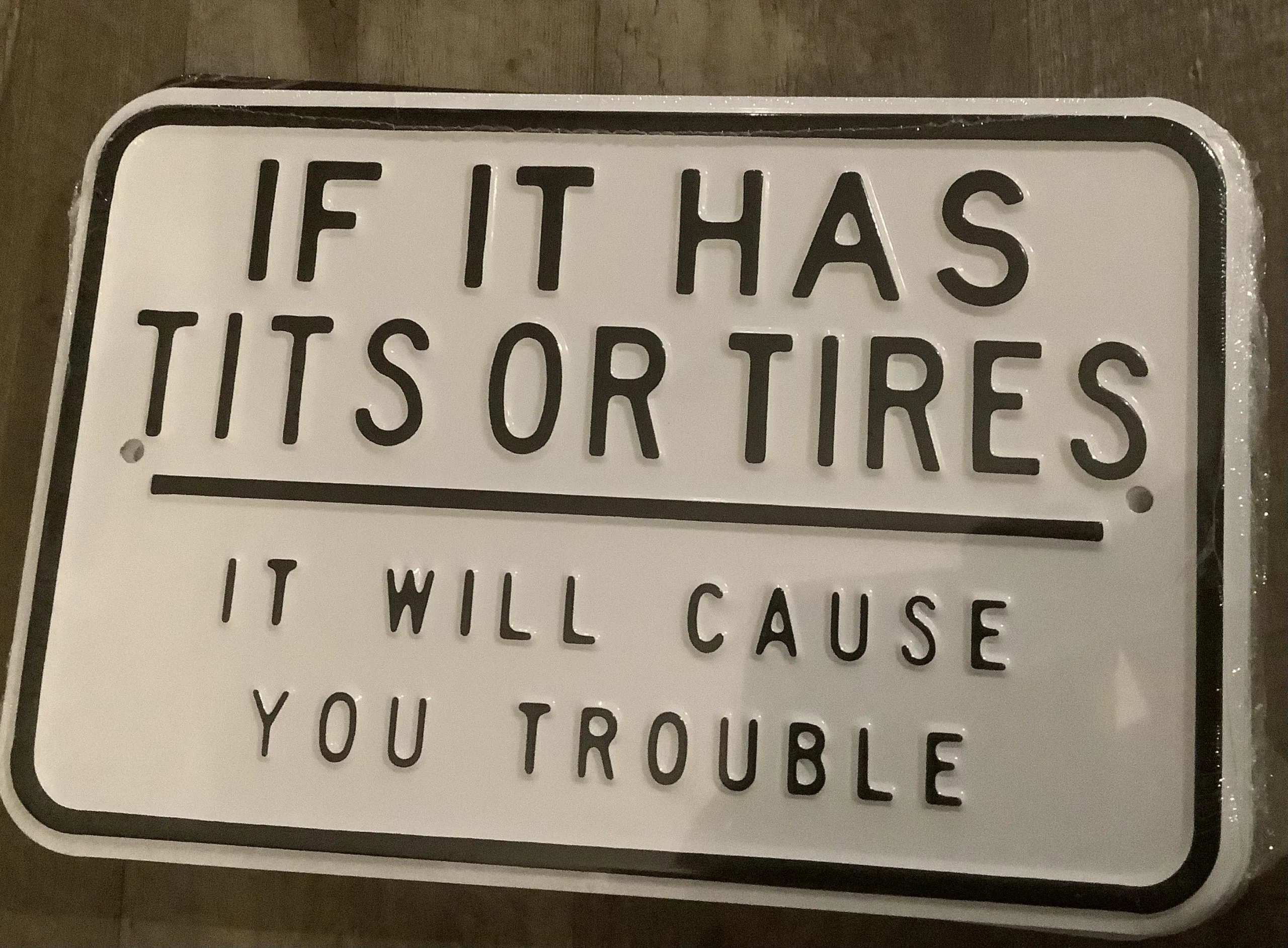 If it has tits or tires it will cause you trouble - Tin Signs Metal Sign