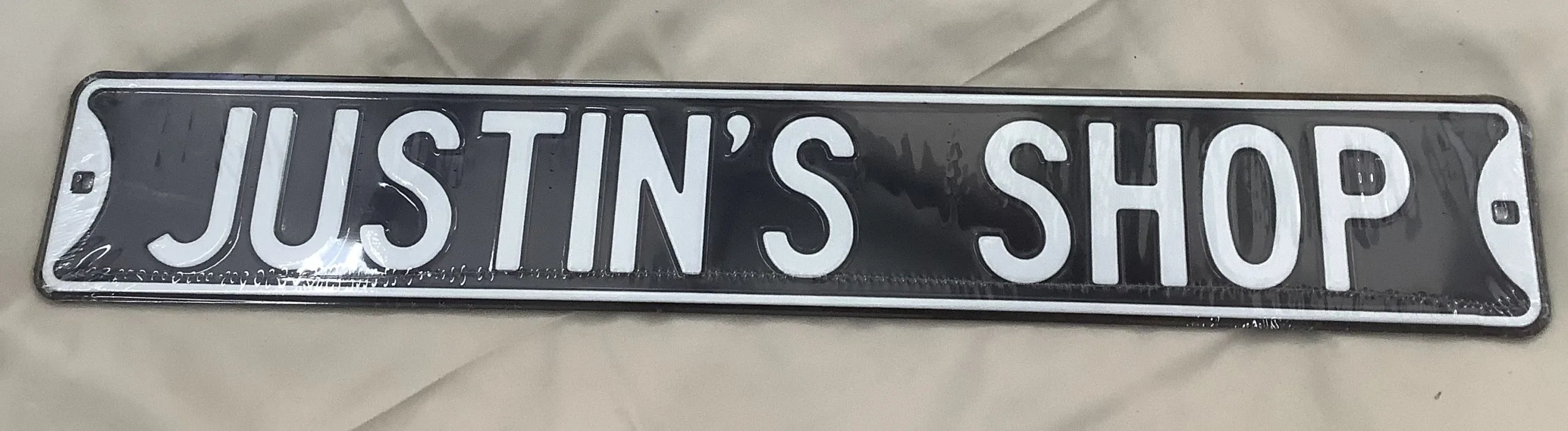 Justin’s Shop - Street Signs Metal Sign