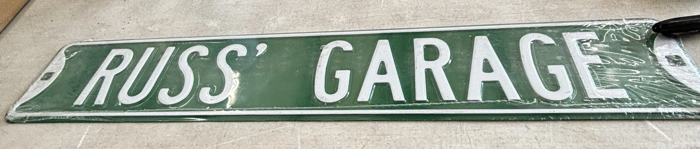 Russ' Garage - Street-Garage/Shop Metal Sign