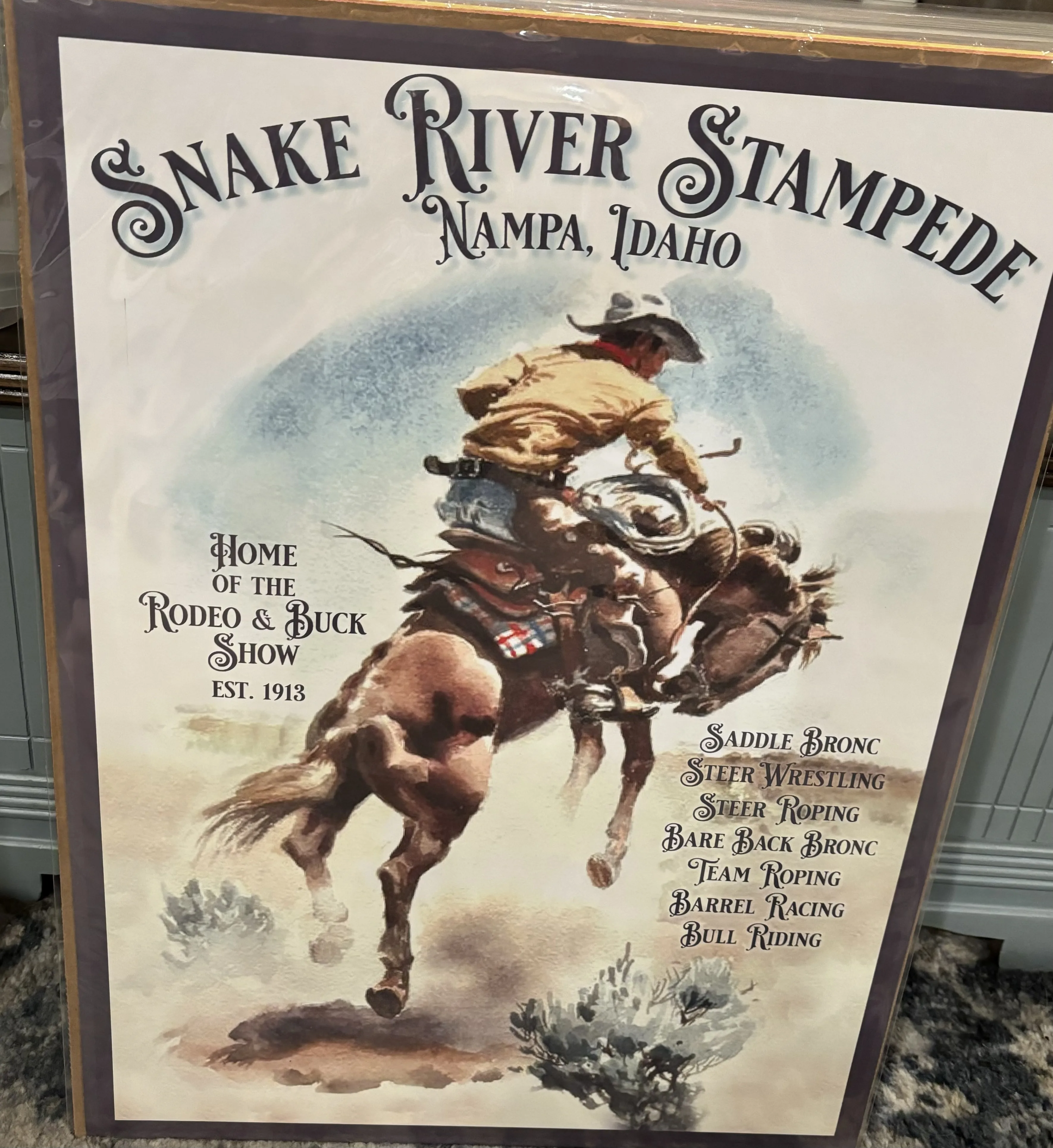 Snake River Stampede-Nampa, Idaho-Home Of The Rodeo & Buck Show Est. 1913 (Large) - Rodeo Posters Metal Sign