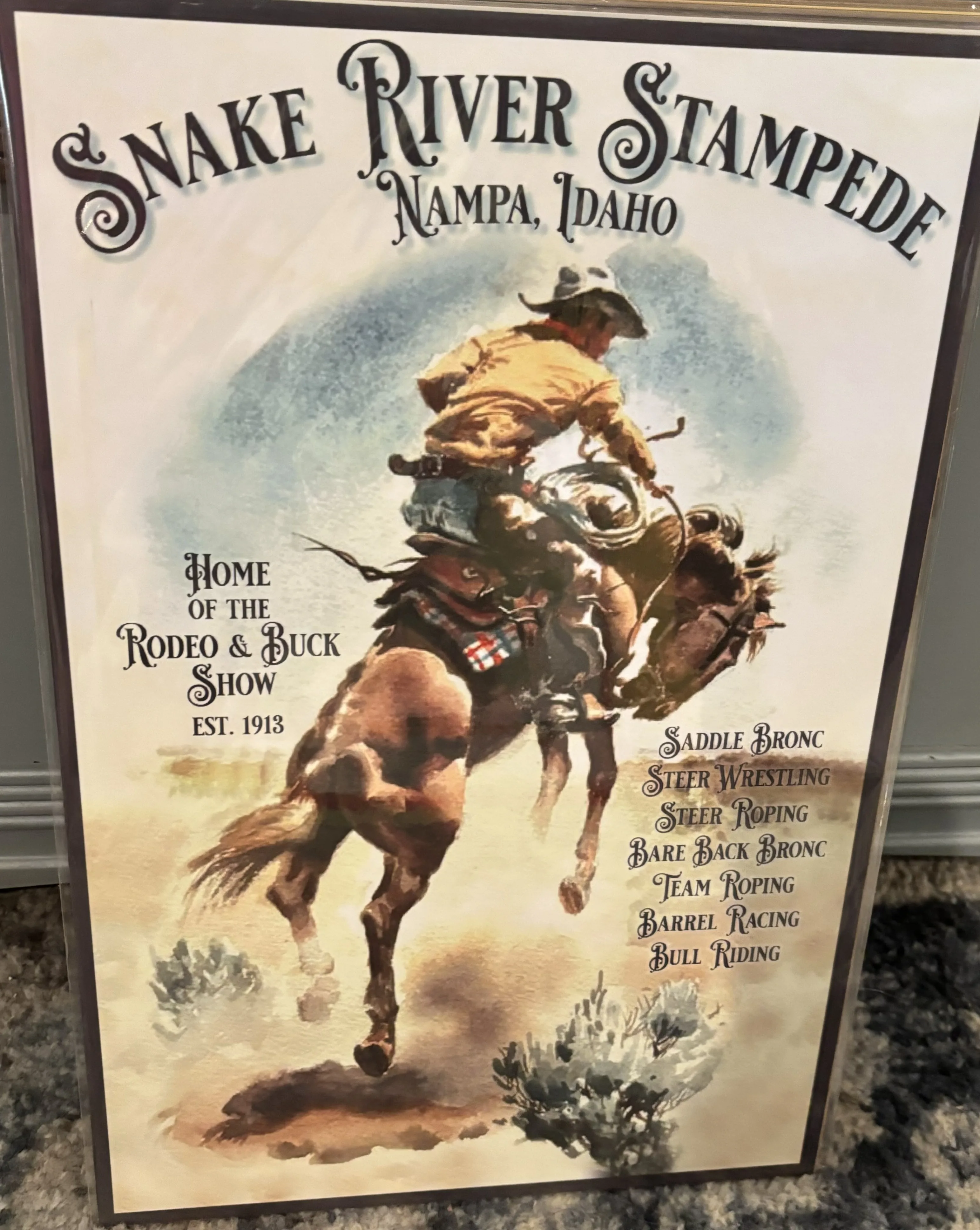 Snake River Stampede-Nampa, Idaho-Home Of The Rodeo & Buck Show Est. 1913 (Small) - Rodeo Posters Metal Sign