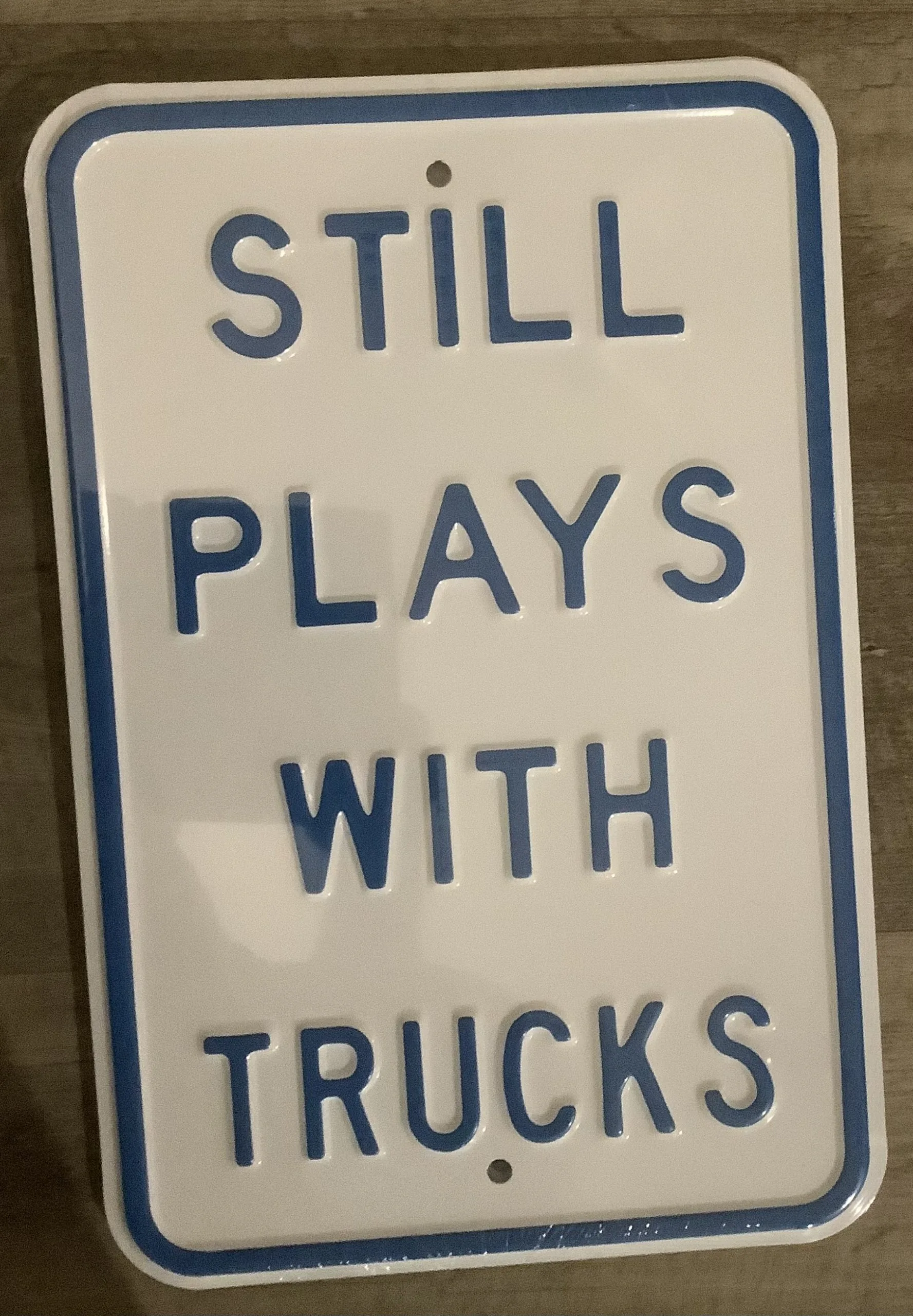 Still plays with trucks - Parking Signs Metal Sign
